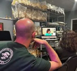 Dr. Sunil Kumar Aggarwal presenting to the NYMHA group at Collar City Mushrooms in Troy, New York